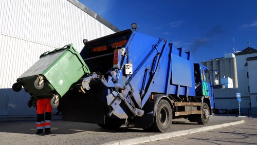 Chelsea Skip Hire vehicle and skip at site entrance