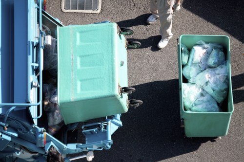 Licensed contractors at work disposing hazardous waste
