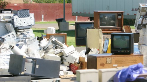 Team organizing items during house clearance