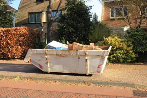 Professional site clearance team managing debris